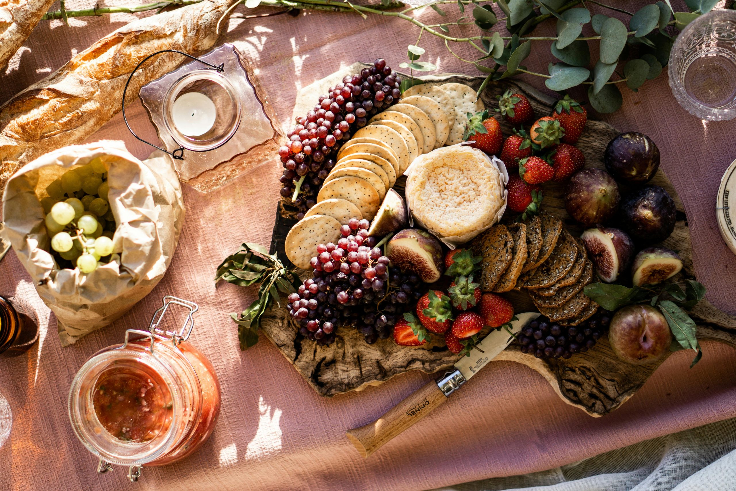 A platter of cheeses and small goods