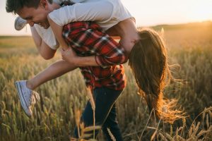 Young farmers in a wheat crop