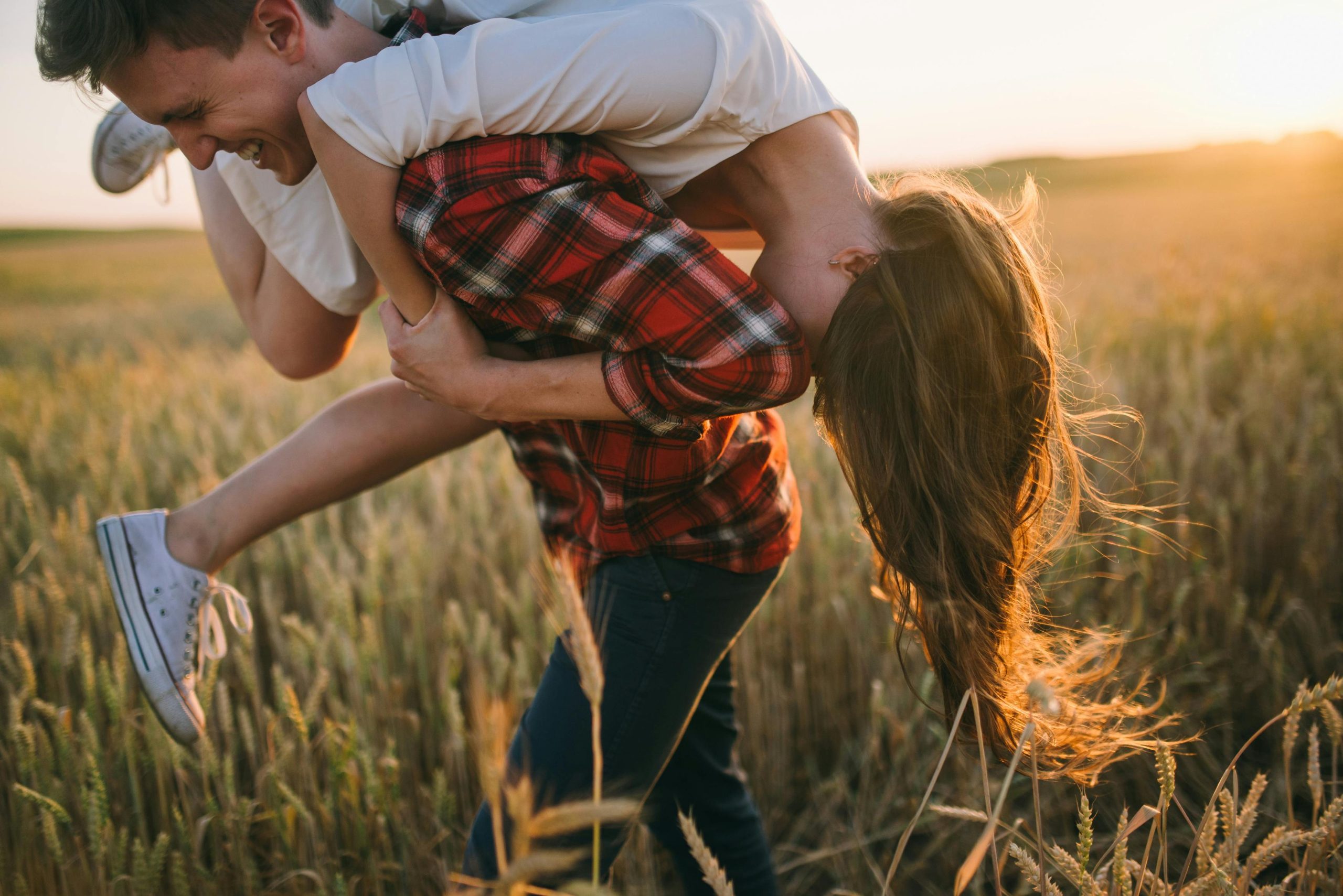 Young farmers in a wheat crop