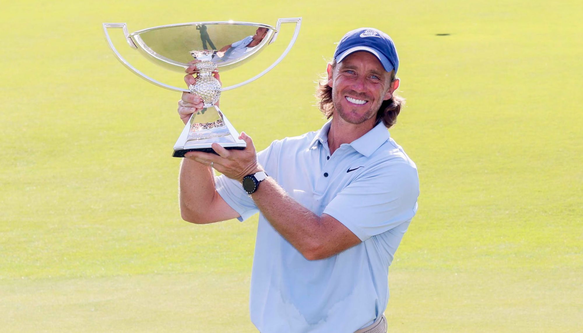 Tommy Fleetwood lifts the FedEx Cup