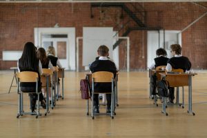 High school students sitting a final exam.